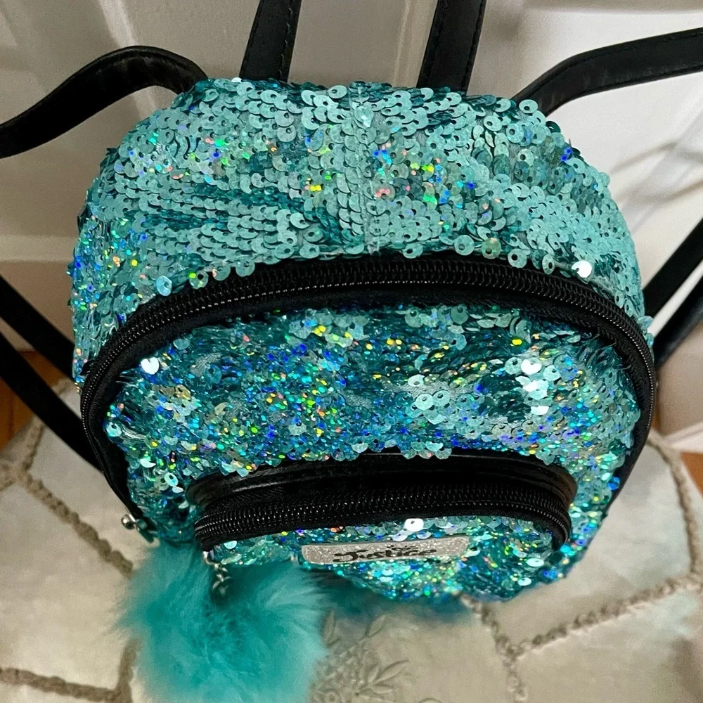 NWOT JUSTICE Backpack in Bright Blue Sparkles with handle and adjustable straps